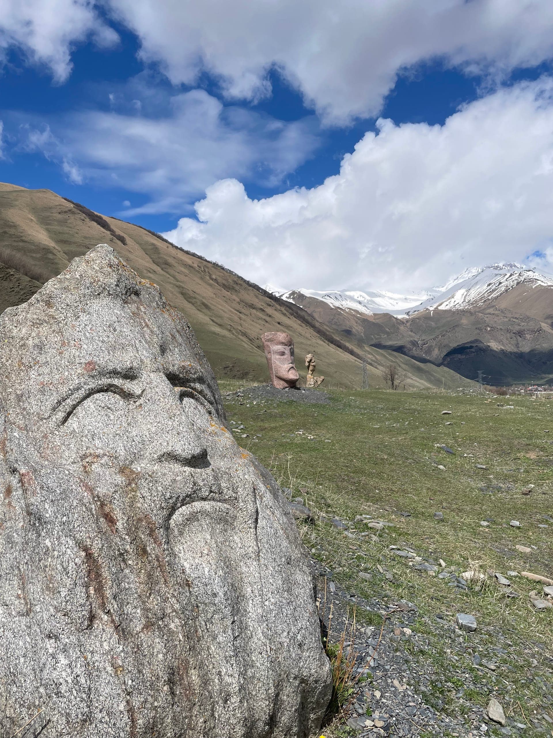 Panoramic Kazbegi valley view with Caucasus peaks