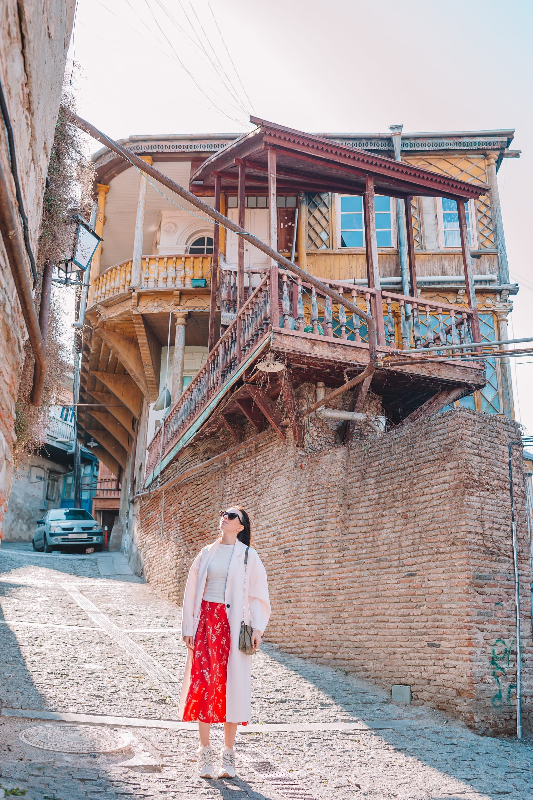 Panoramic view of Tbilisi showing Old Town, modern architecture, and the Kura River — Georgia's captivating capital awaits American travelers
