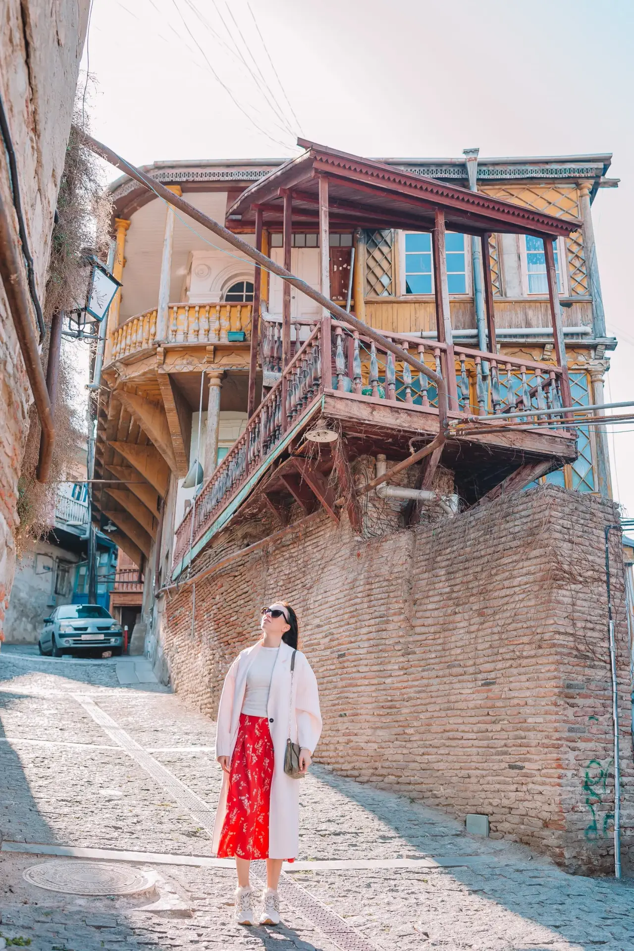 Panoramic view of Tbilisi showing Old Town, modern architecture, and the Kura River — Georgia's captivating capital awaits American travelers